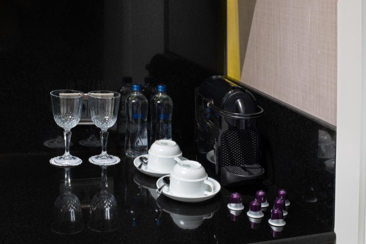 Mercure Istanbul Bomonti Exterior foto A Nespresso coffee machine in a hotel room